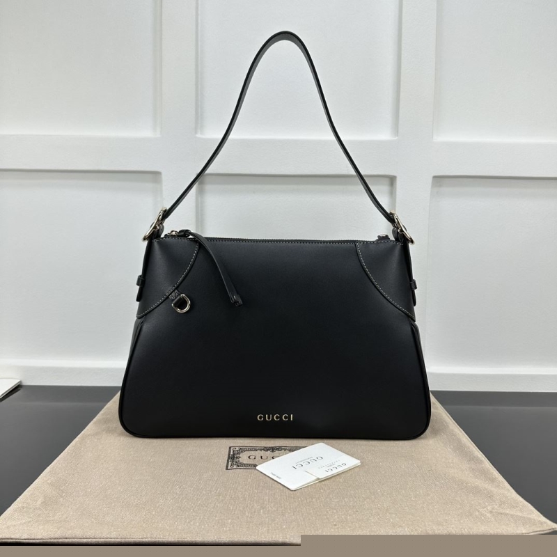 G*u*i top handle bags